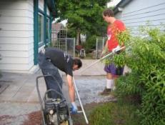 two of our Deerfield Beach sprinkler repair pros are laying down pvc pipes